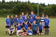 18 July 2018; Leinster player's Bryan Byrne and Peter Dooley with children from the summer camp during the Bank of Ireland Leinster Rugby Summer Camp at Portlaoise RFC, in Togher, Portlaoise, Co. Laois. Photo by Matt Browne/Sportsfile