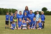 18 July 2018; Leinster player's Bryan Byrne and Peter Dooley with Leinster summer camp coach Katelynn Doran and children from the summer camp during the Bank of Ireland Leinster Rugby Summer Camp at Portlaoise RFC in Togher, Portlaoise, Co. Laois. Photo by Matt Browne/Sportsfile