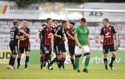 20 July 2018; A dejected Jake Kelly of Bray Wanderers as Bohemians players celebrate their side's fifth goal, scored by Rob Cornwall, during the SSE Airtricity League Premier Division match between Bohemians and Bray Wanderers at Dalymount Park in Dublin. Photo by Tom Beary/Sportsfile
