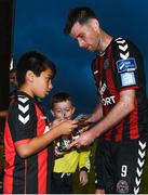20 July 2018; Dinny Corcoran of Bohemians signs autographs for young supporters following the SSE Airtricity League Premier Division match between Bohemians and Bray Wanderers at Dalymount Park in Dublin. Photo by Tom Beary/Sportsfile