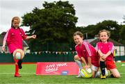 21 July 2018; The FAI in conjunction with FIFA is running one of FIFA’s very successful campaigns, FIFA Live Your Goals, to introduce more females to the game of football. The campaign outlines clear messages, that women’s football is an authentic and attractive expression of a modern lifestyle. It shows optimism, fun belonging and physical beauty. Women’s football is not just socially accepted but highly respected and has become an integral part of football development in the country. Pictured at today’s event is, from left, Kahli Fagan, Erin Farry and Layla Fagan, all aged 8, from Carney, Co. Sligo, at The Showgrounds, Sligo. Photo by Seb Daly/Sportsfile