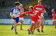 21 July 2018; Cora Courtney of Monaghan in action against Chloe Collins of Cork during the TG4 All-Ireland Senior Championship Group 2 Round 2 match between Cork and Monaghan at St Brendan's Park in Birr, Co. Offaly.  Photo by Brendan Moran/Sportsfile