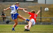 21 July 2018; Ellen McCarron of Monaghan has a shot despite the best efforts of Roisin Phelan of Cork during the TG4 All-Ireland Senior Championship Group 2 Round 2 match between Cork and Monaghan at St Brendan's Park in Birr, Co. Offaly.  Photo by Brendan Moran/Sportsfile