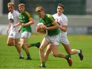 21 July 2018; Cian McBride of Meath in action against Marcus Kiely of Kildare during the Electric Ireland Leinster GAA Football Minor Championship Final match between Meath and Kildare at Bord na Móna O’Connor Park in Tullamore, Co. Offaly. Photo by Piaras Ó Mídheach/Sportsfile