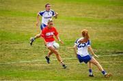 21 July 2018; Orla Finn of Cork in action against Gráinne McNally, right, and Sharon Courtney of Monaghan during the TG4 All-Ireland Senior Championship Group 2 Round 2 match between Cork and Monaghan at St Brendan's Park in Birr, Co. Offaly.  Photo by Brendan Moran/Sportsfile