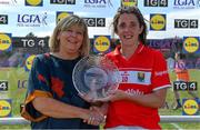 21 July 2018; Ciara O'Sullivan of Cork is presented with the Player of the Match by President of LGFA Máire Hickey after the TG4 All-Ireland Senior Championship Group 2 Round 2 match between Cork and Monaghan at St Brendan's Park in Birr, Co. Offaly.  Photo by Brendan Moran/Sportsfile