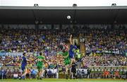 21 July 2018; Hugh McFadden of Donegal and Tadhg O'Rourke of Roscommon contest the throw-in during the GAA Football All-Ireland Senior Championship Quarter-Final Group 2 Phase 2 match between Roscommon and Donegal at Dr Hyde Park in Roscommon. Photo by Ramsey Cardy/Sportsfile