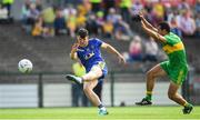 21 July 2018; Diarmuid Murtagh of Roscommon shoots at goal despite the attention of Frank McGlynn of Donegal during the GAA Football All-Ireland Senior Championship Quarter-Final Group 2 Phase 2 match between Roscommon and Donegal at Dr Hyde Park in Roscommon. Photo by Ramsey Cardy/Sportsfile