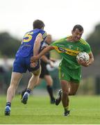 21 July 2018; Frank McGlynn of Donegal is tackled by Cathal Cregg of Roscommon during the GAA Football All-Ireland Senior Championship Quarter-Final Group 2 Phase 2 match between Roscommon and Donegal at Dr Hyde Park in Roscommon. Photo by Ramsey Cardy/Sportsfile