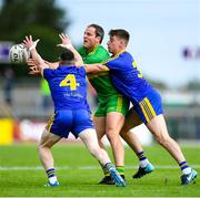 21 July 2018; Michael Murphy of Donegal in action against Sean McDermott, left, and Niall McInerney of Roscommon during the GAA Football All-Ireland Senior Championship Quarter-Final Group 2 Phase 2 match between Roscommon and Donegal at Dr Hyde Park in Roscommon. Photo by David Fitzgerald/Sportsfile