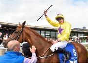 21 July 2018; Jockey James Doyle celebrates winning the Darley Irish Oaks on Sea of Class during Irish Oaks Day at the Curragh Racecourse in Kildare. Photo by Matt Browne/Sportsfile