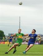 21 July 2018; Diarmuid Murtagh of Roscommon in action against Stephen McMenamin of Donegal during the GAA Football All-Ireland Senior Championship Quarter-Final Group 2 Phase 2 match between Roscommon and Donegal at Dr Hyde Park in Roscommon. Photo by Ramsey Cardy/Sportsfile