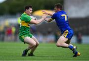 21 July 2018; Odhrán Mac Niallais of Donegal in action against Conor Devaney of Roscommon during the GAA Football All-Ireland Senior Championship Quarter-Final Group 2 Phase 2 match between Roscommon and Donegal at Dr Hyde Park in Roscommon. Photo by David Fitzgerald/Sportsfile