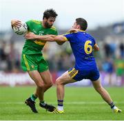 21 July 2018; Odhrán Mac Niallais of Donegal in action against Fintan Cregg of Roscommon during the GAA Football All-Ireland Senior Championship Quarter-Final Group 2 Phase 2 match between Roscommon and Donegal at Dr Hyde Park in Roscommon. Photo by David Fitzgerald/Sportsfile