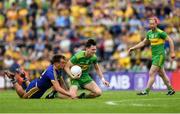 21 July 2018; Michael Langan of Donegal in action against Enda Smith of Roscommon during the GAA Football All-Ireland Senior Championship Quarter-Final Group 2 Phase 2 match between Roscommon and Donegal at Dr Hyde Park in Roscommon. Photo by David Fitzgerald/Sportsfile
