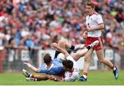 21 July 2018; Philip McMahon of Dublin is taken down by Tiernan McCann of Tyrone during the GAA Football All-Ireland Senior Championship Quarter-Final Group 2 Phase 2 match between Tyrone and Dublin at Healy Park in Omagh, Tyrone. Photo by Oliver McVeigh/Sportsfile