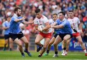 21 July 2018; Richard Donnelly of Tyrone in action against Jack McCaffrey, left, Philly McMahon of Dublin during the GAA Football All-Ireland Senior Championship Quarter-Final Group 2 Phase 2 match between Tyrone and Dublin at Healy Park in Omagh, Tyrone. Photo by Ray McManus/Sportsfile
