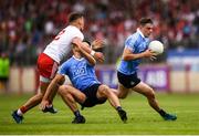 21 July 2018; Brian Howard of Dublin makes a break as his Dublin team-mate James McCarthy is tackled by Michael McKernan of Tyrone during the GAA Football All-Ireland Senior Championship Quarter-Final Group 2 Phase 2 match between Tyrone and Dublin at Healy Park in Omagh, Tyrone. Photo by Stephen McCarthy/Sportsfile
