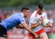 21 July 2018; Richard Donnelly of Tyrone in action against James McCarthy of Dublin during the GAA Football All-Ireland Senior Championship Quarter-Final Group 2 Phase 2 match between Tyrone and Dublin at Healy Park in Omagh, Tyrone. Photo by Ray McManus/Sportsfile