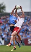 21 July 2018; Brian Howard of Dublin in action against Colm Cavanagh of Tyrone during the GAA Football All-Ireland Senior Championship Quarter-Final Group 2 Phase 2 match between Tyrone and Dublin at Healy Park in Omagh, Tyrone. Photo by Oliver McVeigh/Sportsfile