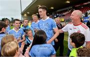 21 July 2018; Brian Fenton of Dublin with Dublin and Tyrone supporters after the GAA Football All-Ireland Senior Championship Quarter-Final Group 2 Phase 2 match between Tyrone and Dublin at Healy Park in Omagh, Tyrone. Photo by Oliver McVeigh/Sportsfile
