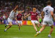 22 July 2018; Peter Cooke of Galway kicks a point, despite the attention of David Hyland of Kildare during the GAA Football All-Ireland Senior Championship Quarter-Final Group 1 Phase 2 match between Kildare and Galway at St Conleth's Park in Newbridge, Co Kildare. Photo by Sam Barnes/Sportsfile