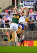 22 July 2018; Kieran Donaghy of Kerry fields a high ball ahead of Vinny Corey of Monaghan during the GAA Football All-Ireland Senior Championship Quarter-Final Group 1 Phase 2 match between Monaghan and Kerry at St Tiernach's Park in Clones, Monaghan. Photo by Brendan Moran/Sportsfile