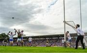 22 July 2018; Kieran Donaghy of Kerry wins a high ball from Kieran Hughes, left, and Vinny Corey of Monaghan to set up Kerry's late goal during the GAA Football All-Ireland Senior Championship Quarter-Final Group 1 Phase 2 match between Monaghan and Kerry at St Tiernach's Park in Clones, Monaghan. Photo by Brendan Moran/Sportsfile