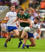 22 July 2018; Mark Griffin of Kerry in action against Drew Wylie of Monaghan and Niall Kearns during the GAA Football All-Ireland Senior Championship Quarter-Final Group 1 Phase 2 match between Monaghan and Kerry at St Tiernach's Park in Clones, Monaghan. Photo by Philip Fitzpatrick/Sportsfile