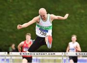 22 July 2018; Ciaran Nugent from Carraig na bhFear A.C. Co Cork on his way to win the boys under-19 400m hurdles during Irish Life Health National T&F Juvenile Day 3 at Tullamore Harriers Stadium in Tullamore, Co Offaly. Photo by Matt Browne/Sportsfile