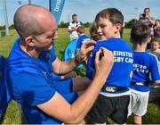 25 July 2018; Leinster's Devin Toner signs a jersey for a camp participant during the Bank of Ireland Leinster Rugby Summer Camp at Cill Dara RFC in Kildare. Photo by Seb Daly/Sportsfile