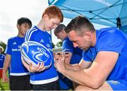 25 July 2018; Leinster's Jack Conan signs a jersey for a camp participant during the Bank of Ireland Leinster Rugby Summer Camp at Cill Dara RFC in Kildare. Photo by Seb Daly/Sportsfile