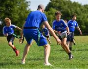 25 July 2018; Leinster's Devin Toner in action with camp participants during the Bank of Ireland Leinster Rugby Summer Camp at Cill Dara RFC in Kildare. Photo by Seb Daly/Sportsfile