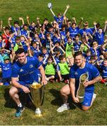 25 July 2018; Leinster players James Ryan and Andrew Porter with camp participants during the Bank of Ireland Leinster Rugby Summer Camp at Clondalkin RFC in Dublin. Photo by David Fitzgerald/Sportsfile