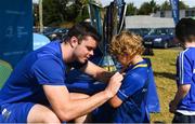 25 July 2018; Leinster player James Ryan with camp participants during the Bank of Ireland Leinster Rugby Summer Camp at Clondalkin RFC in Dublin. Photo by David Fitzgerald/Sportsfile