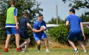 25 July 2018; Leinster player Andrew Porter with camp participants during the Bank of Ireland Leinster Rugby Summer Camp at Clondalkin RFC in Dublin. Photo by David Fitzgerald/Sportsfile