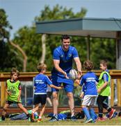 25 July 2018; Leinster player James Ryan with camp participants during the Bank of Ireland Leinster Rugby Summer Camp at Clondalkin RFC in Dublin. Photo by David Fitzgerald/Sportsfile