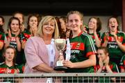 25 July 2018; Mayo captain Tara Needham is presented with the cup by LGFA President Marie Hickey after the All-Ireland Ladies Football U16 B Championship Final between Laois and Mayo at Duggan Park in Ballinasloe, Co. Galway. Photo by Diarmuid Greene/Sportsfile