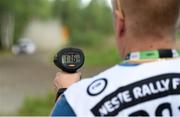 26 July 2018; A Rally Finland Marshall checking the speed of the cars during a Shakedown prior to Round 8 of the FIA World Rally Championship in Jyväskylä, Finland. Photo by Philip Fitzpatrick/Sportsfile