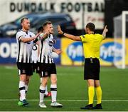 26 July 2018; Sean Hoare of Dundalk, centre, remonstrates with referee Harald Lechner during the UEFA Europa League 2nd Qualifying Round First Leg match between Dundalk and AEK Larnaca at Oriel Park in Dundalk, Co. Louth. Photo by Seb Daly/Sportsfile