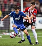 27 July 2018; Jake Keegan of St Patrick's Athletic in action against Eoin Toal of Derry City during the SSE Airtricity League Premier Division match between Derry City and St Patrick's Athletic at the Brandywell in Derry. Photo by Oliver McVeigh/Sportsfile