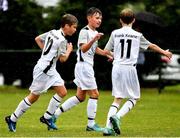 28 July 2018; Taylor Mooney of Crumlin United, centre, celebrates with team-mates after scoring his side's third goal against Portumna Town, during Ireland's premier underaged soccer tournament, the Volkswagen Junior Masters. The competition sees U13 teams from around Ireland compete for the title and a €2,500 prize for their club, over the days of July 28th and 29th, at AUL Complex in Dublin. Photo by Seb Daly/Sportsfile