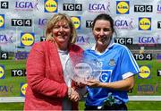 28 July 2018; Lyndsey Davey of Dublin is presented with the Player of the Match by President of LGFA Máire Hickey after the TG4 All-Ireland Ladies Football Senior Championship qualifier Group 1 Round 3 match between Dublin and Mayo at Dr Hyde Park in Roscommon. Photo by Brendan Moran/Sportsfile