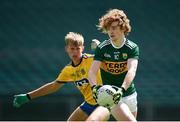 28 July 2018; Paul Walsh of Kerry in action against Colin Walsh of Roscommon during the Electric Ireland GAA Football All-Ireland Minor Championship Quarter-Final match between Kerry and Roscommon at the Gaelic Grounds in Limerick. Photo by Diarmuid Greene/Sportsfile