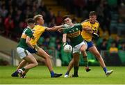 28 July 2018; Paul O Shea of Kerry in action against Colin Walsh, left, and Shane Cunnane of Roscommon during the Electric Ireland GAA Football All-Ireland Minor Championship Quarter-Final match between Kerry and Roscommon at the Gaelic Grounds in Limerick. Photo by Diarmuid Greene/Sportsfile