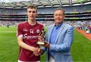 28 July 2018: Pictured is Tony Dunlea, Electric Ireland Business Markets Sales Manager at the Electric Ireland GAA Minor Championships, presenting Donal O'Shea of Galway with the Player of the Match award for his major performance in the Electric Ireland GAA Minor Hurling Championship Semi-Final. Throughout the Championships, fans can follow the conversation, vote for their player of the week, support the Minors and be a part of something major through the hashtag #GAAThisIsMajor. Photo by Ray McManus/Sportsfile