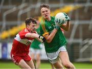 28 July 2018; Cian McBride of Meath in action against Enda Downey of Derry during the Electric Ireland GAA Football All-Ireland Minor Championship Quarter-Final match between Meath and Derry at the Athletic Grounds in Armagh. Photo by Oliver McVeigh/Sportsfile