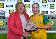 28 July 2018; Geraldine McLaughlin of Donegal is presented with the Player of the Match by President of LGFA Máire Hickey after the TG4 All-Ireland Ladies Football Senior Championship qualifier Group 1 Round 3 match between Kerry and Donegal at Dr Hyde Park in Roscommon. Photo by Brendan Moran/Sportsfile