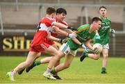 28 July 2018; Niall Bennett of Meath in action against Enda Downey and Iarlaith Donaghy of Derry during the Electric Ireland GAA Football All-Ireland Minor Championship Quarter-Final match between Meath and Derry at the Athletic Grounds in Armagh. Photo by Oliver McVeigh/Sportsfile