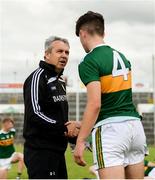 28 July 2018; Kerry manager Peter Keane exchanges a handshake with David Mangan of Kerry after the Electric Ireland GAA Football All-Ireland Minor Championship Quarter-Final match between Kerry and Roscommon at the Gaelic Grounds in Limerick. Photo by Diarmuid Greene/Sportsfile